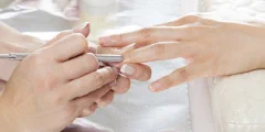 Manicured hands with painted nails